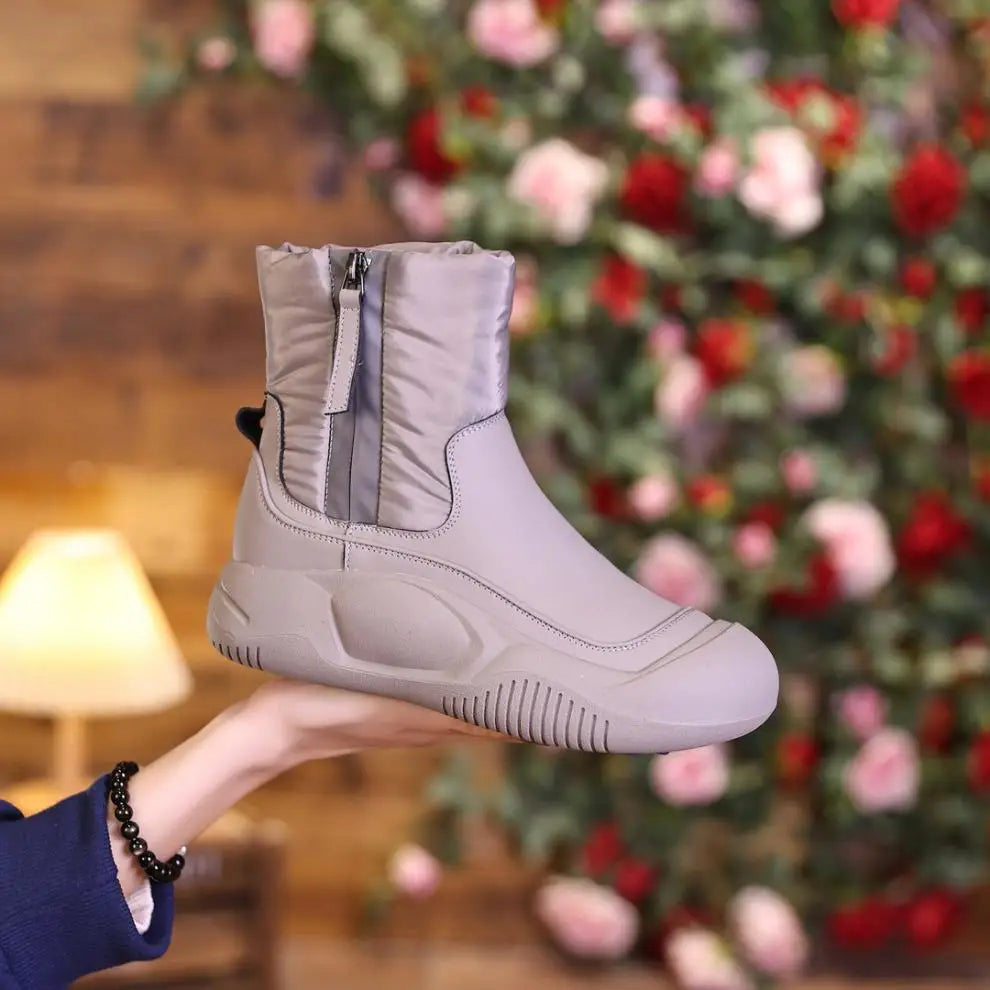 Women's quilted winter ankle boots with plush lining and side zip