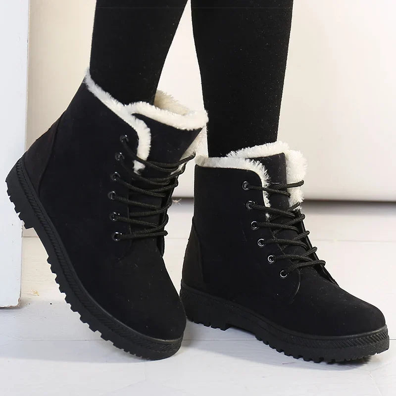 Women's faux-fur-lined lace-up ankle boots with ridged soles