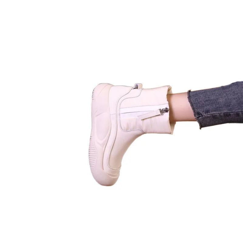 Women's quilted winter ankle boots with plush lining and side zip