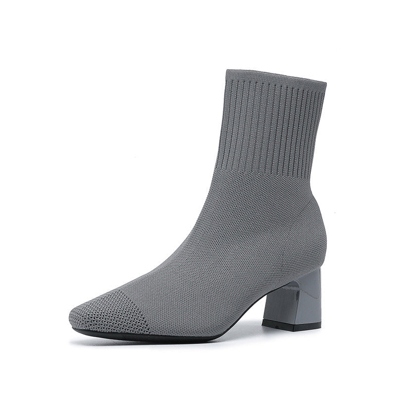 Women's stretch knit mid-calf sock boots with chunky heel